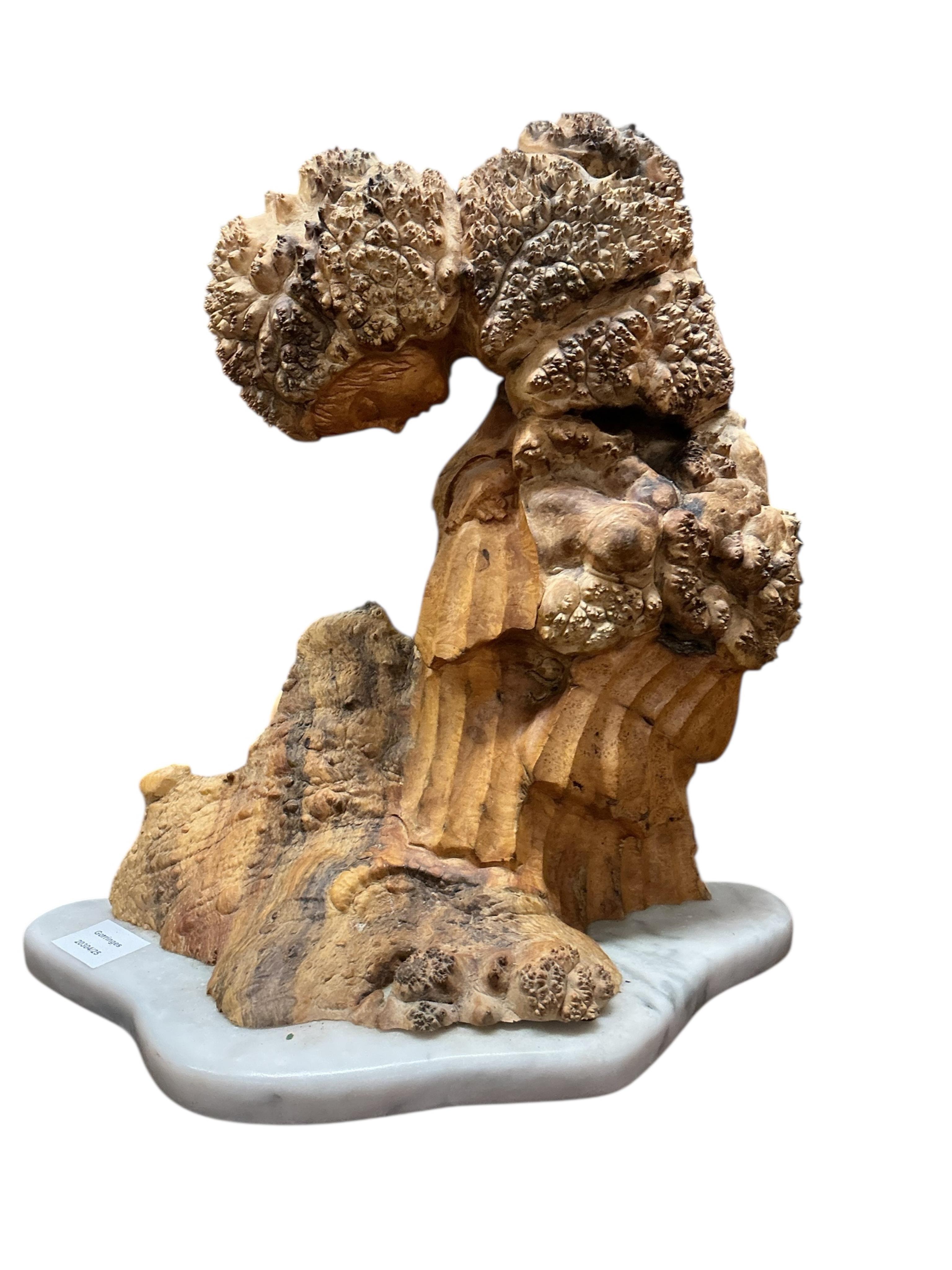 Pierre Decorse (b.1953), a stylised sculpture of a woman with head bowed, raised on a white marble base, height 40cm